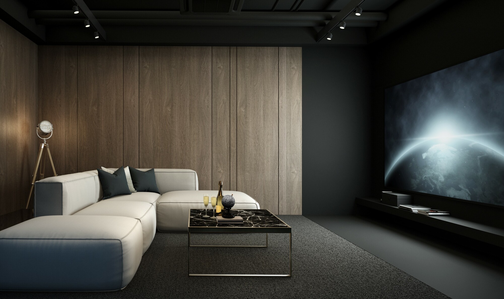 A home cinema with a beige sofa to the left hand side facing the right wall with a large projector image on it that is dark